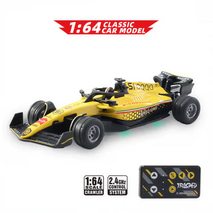 Auto de Fórmula 1 de metal a escala 1:64 con control remoto de alta precisión.