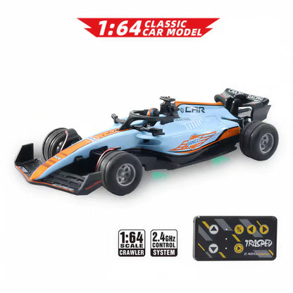 Auto de Fórmula 1 de metal a escala 1:64 con control remoto de alta precisión.
